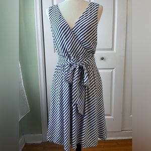 Loft fit and flare stripped occasion dress with bodice front and sash. Size 8